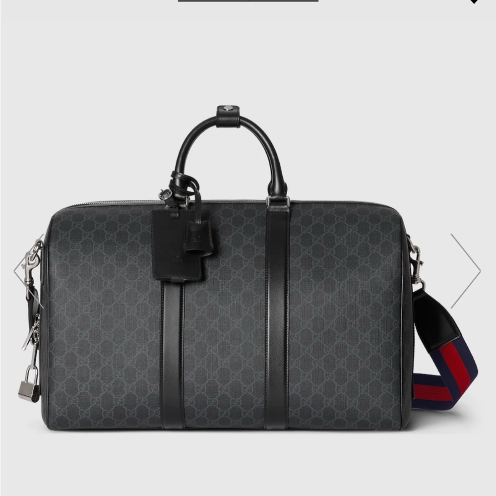 Gucci Black Duffel Bag with Leather Handles and Detachable Strap
